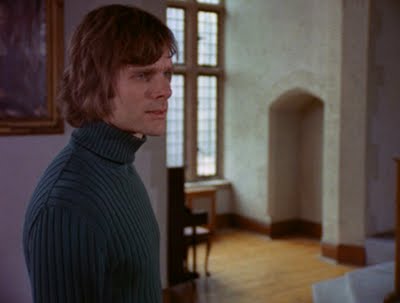 Keir Dullea, all turtlenecks and shaggy 1970's hair, as Peter in "Black Christmas" (1974). 